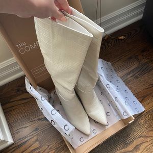 White knee-high boots